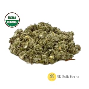 May include: A close-up of a pile of dried, green, organic yarrow herb. The herb is USDA certified organic. The image includes the text "USDA Organic" and "SK Bulk Herbs".