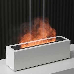 Le diffuseur d'arôme ultime éclairé par les flammes"