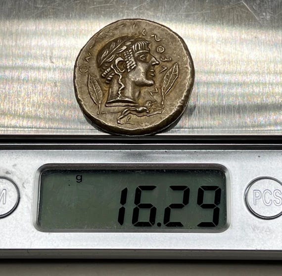 341-329 BC Ancient Greece Apollo Son of Zeus Coin - Silver