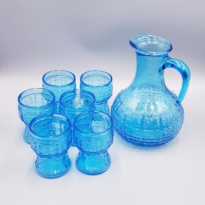 Vintage Blue Glass Pitcher Set: Embossed Floral Medallions, Mid-Century Barware