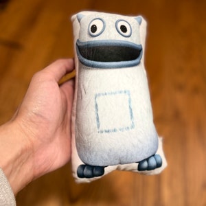 Almohada pequeña Big Tum de Alphablocks y Numberblocks. ¡Qué rico! ¿Quién está en mi barriga?