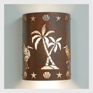 Nautical and Coastal style wall light for indoor and outdoor use featuring our cranes and palm tree design.