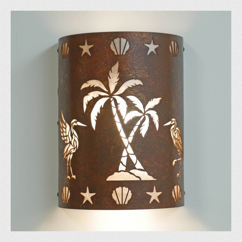 Nautical and Coastal style wall light for indoor and outdoor use featuring our cranes and palm tree design.
