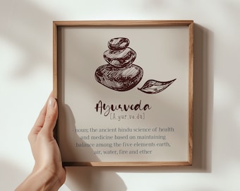 Könnte beinhalten: Ein gerahmter Druck mit braunem Hintergrund und einer handgezeichneten Illustration eines Steinhaufens. Der Text "Ayurveda [A.yur.ve.da]" befindet sich unter der Illustration. Der Text "Substantiv; die alte hinduistische Wissenschaft von Gesundheit und Medizin, die auf der Aufrechterhaltung des Gleichgewichts zwischen den fünf Elementen Erde, Luft, Wasser, Feuer und Äther basiert" befindet sich unter dem Text "Ayurveda".