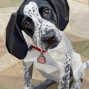 May include: A fabric wall hanging featuring a pieced quilt portrait of a dog with black and white spotted fur. The dog has dark ears, brown eyes, and a red collar with a tag. The background consists of geometric tan and beige fabric shapes.
