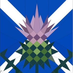 May include: A square quilt block pattern featuring a central thistle flower with light and dark purple petals atop a green, diamond-patterned base. The background consists of a blue field with a white diagonal cross, creating a geometric design.