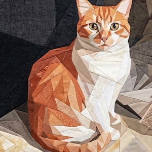 May include: A detailed textile art piece depicting a seated cat. The cat features orange and white fur, with geometric shapes creating its form. The background has a mix of dark and light neutral tones.