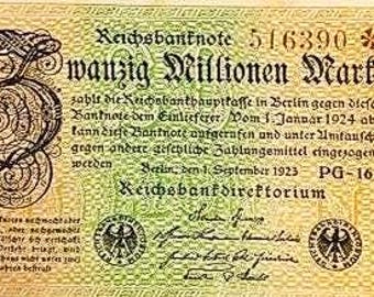 May include: A vintage German banknote with a yellow and green background featuring the text "Zwanzig Millionen Mark" and "Reichsbanknote". The bill includes black decorative scrollwork, two circular seals with eagle emblems, and the date 1923.