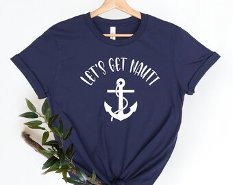 May include: A navy blue t-shirt with a white anchor and the text "Let's Get Nauti" printed on the front.