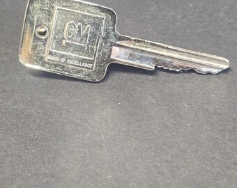 Vintage GM Key Clip Mens One Size Silver Mark Of Excellence Logo Tie Bar
