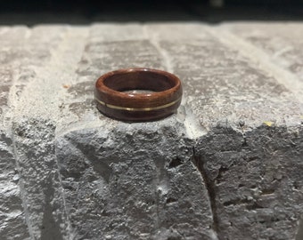 Mahogany and brass ring