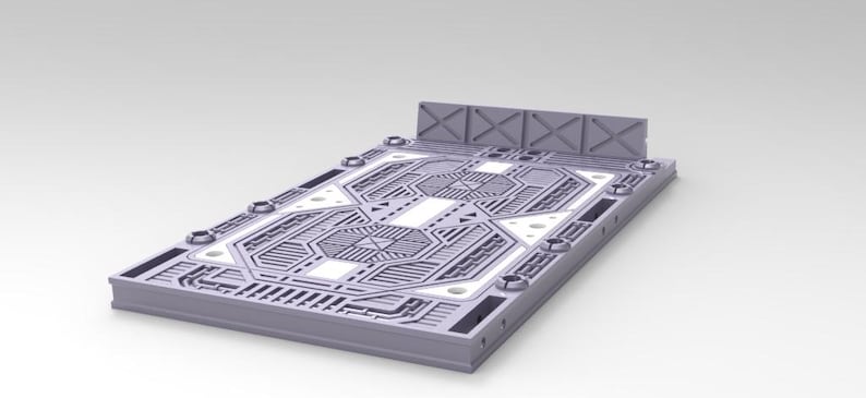 Peut inclure: Plate-forme rectangulaire grise avec un design g&eacute;om&eacute;trique complexe. La plate-forme pr&eacute;sente un bord sur&eacute;lev&eacute; et un panneau arri&egrave;re avec un motif en forme de X. La surface est d&eacute;taill&eacute;e avec des lignes et des formes semblables &agrave; des circuits.