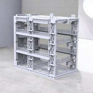 Peut inclure: Maquette architecturale gris clair &agrave; plusieurs niveaux avec des d&eacute;tails complexes. La structure pr&eacute;sente des plateformes, des passerelles et des poutres de support, cr&eacute;ant un design industriel complexe. Le mod&egrave;le est fait d'un mat&eacute;riau solide et uniforme.