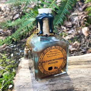 Metamorphosis Transformation Potion | Decorative Color Changing Bottle | Wizard Prop | Bookshelf Decor