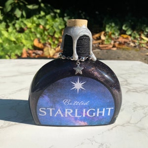 Bottled Starlight | Magical Apothecary Potion Bottle | Witch and Wizard Potion | Iridescent Color Changing Potion | Bookshelf Decor