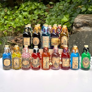 May include: A selection of decorative potion bottles with cork stoppers and colourful wax seals. Each bottle has a unique label with text and illustrations. The bottles are arranged on a white surface with a green leafy background.