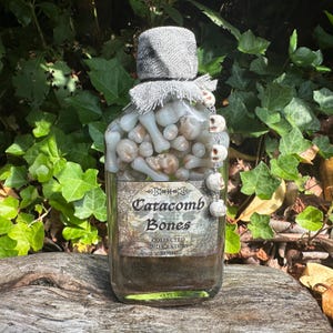 Huesos de catacumba que brillan en la oscuridad / Botella de poción decorativa que cambia de color / Decoración gótica de terror para Halloween