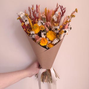 orange daisy bouquet for her