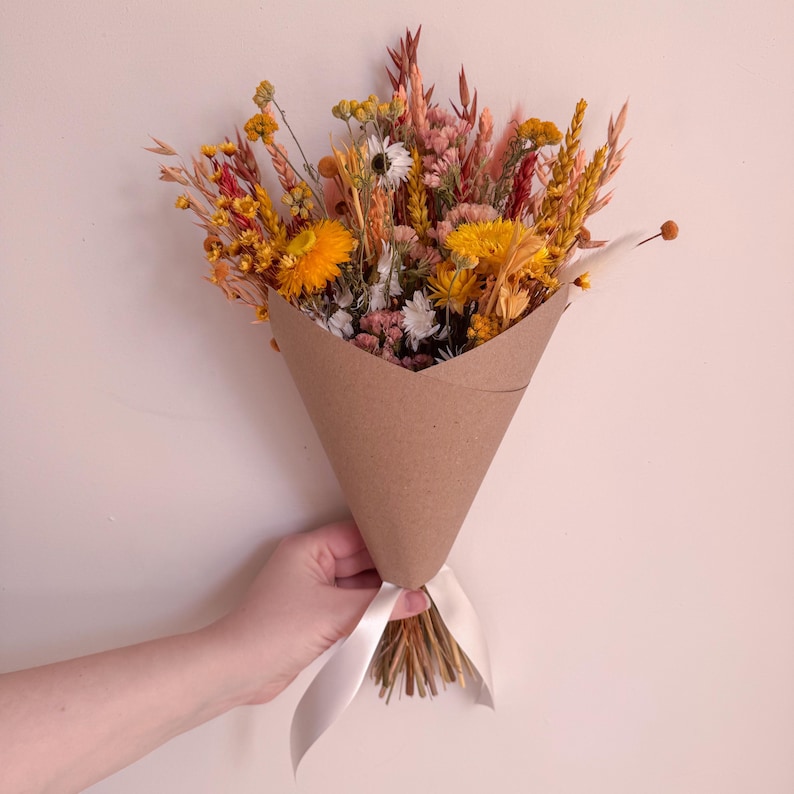 small burnt orange dried flower arrangement