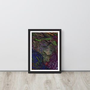 May include: A framed abstract art print with a black frame. The print features a colorful, intricate design with shades of green, blue, purple, and orange. The design appears to be a stylized portrait of a person.