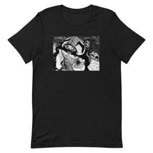 May include: Black and white graphic t-shirt featuring a detailed illustration of a creature with a large eye and a hooded head.