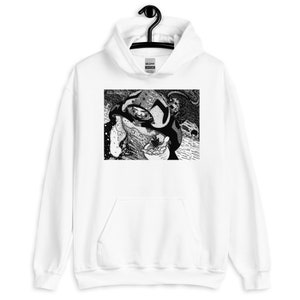 May include: White hooded sweatshirt with a black and white graphic print of a person wearing a hooded cloak and holding a small object. The graphic is in a comic book style.