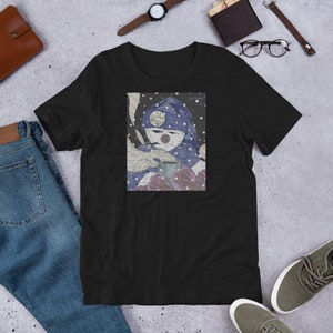 May include: Black t-shirt with a graphic of a person wearing a blue hooded jacket and holding a cup of coffee. The person is standing in a snowy landscape with snowflakes falling. The text "All I Want For Christmas Is You" is on the person's hat.