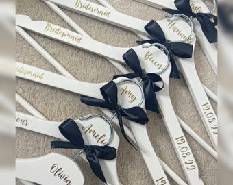 Personalised wooden hangers for wedding | wedding day | personalised detail | bride | bridesmaid | groom | gift | dress