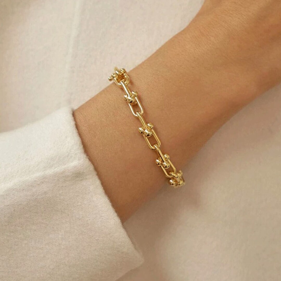 Gold plated link chain bracelet with heart shape lock 