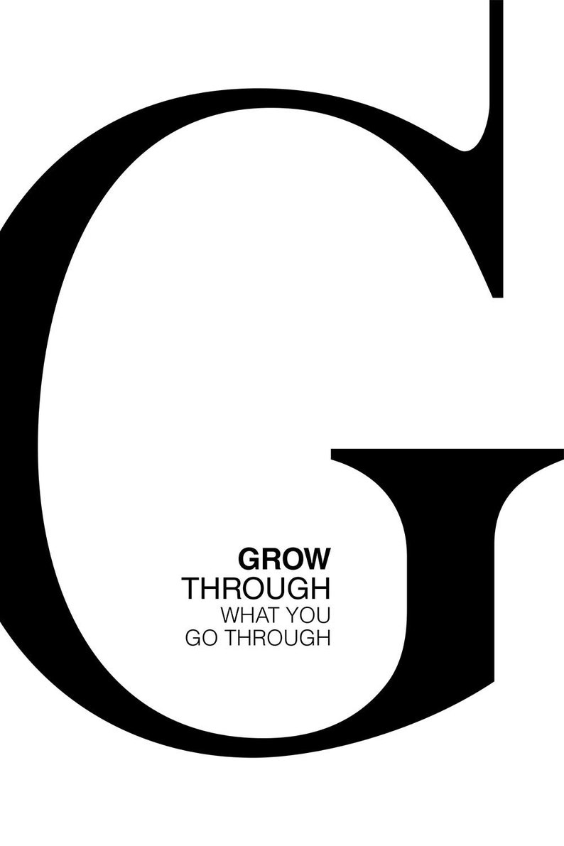 May include: Black and white graphic with the letter G in a large font. The text "GROW THROUGH WHAT YOU GO THROUGH" is written in a smaller font below the letter.