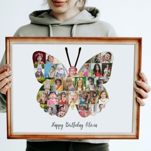 May include: A framed butterfly-shaped photo collage with numerous small portraits. The collage is in a wooden frame and features the text "Happy Birthday Olivia" in script. The butterfly design has black antennae.