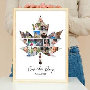 May include: A framed print featuring a maple leaf design filled with various photos. The print includes the text "Canada Day" and the date "1 July, 2025" in a stylish font. The frame is made of light-colored wood.