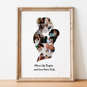 May include: A framed print with a light brown wooden frame, displaying a silhouette of a mother and child filled with family photographs. The print includes the text "Where Life Begins and Love Never Ends" in black script.