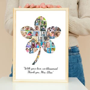 May include: A framed photo collage in a light wood frame. The collage is in the shape of a four-leaf clover and is filled with multiple small photos. The text at the bottom reads, "With your love, we blossomed. Thank you, Mrs. Elisa."