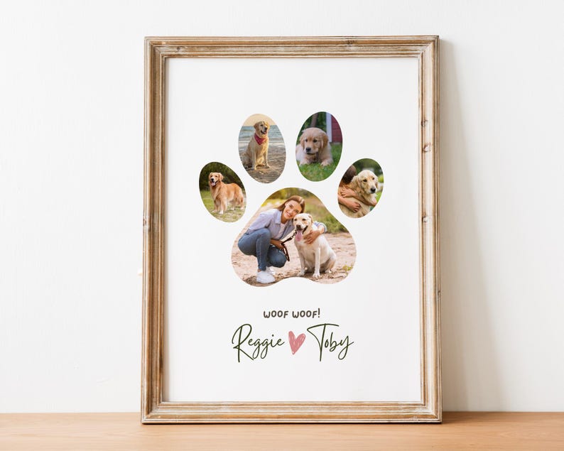 May include: A framed wall art print featuring a collage of five dog photographs arranged in the shape of a paw print. Below the paw print, the text reads WOOF WOOF! followed by the names Reggie and Toby separated by a small pink heart.