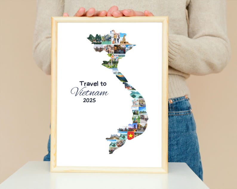 May include: A framed print featuring a collage of images forming the shape of Vietnam. The print includes the text "Travel to Vietnam 2025" in a decorative font. The frame is a light wood color.