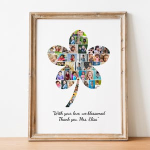 May include: Framed print featuring a four-leaf clover design filled with small photos. The artwork includes the text "With your love, we blossomed. Thank you, Mrs. Elisa" in black script. The frame is a light brown color.