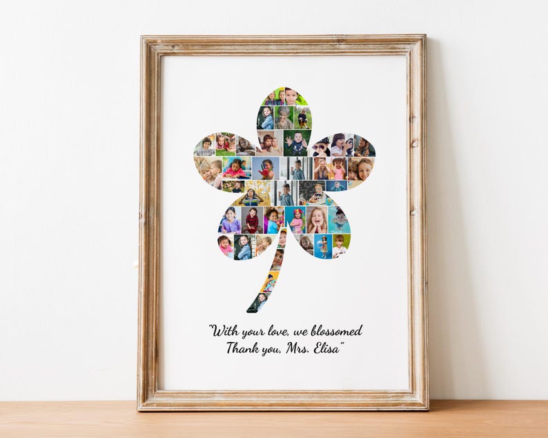 May include: Framed print featuring a four-leaf clover design filled with small photos. The artwork includes the text "With your love, we blossomed. Thank you, Mrs. Elisa" in black script. The frame is a light brown color.
