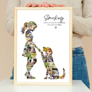May include: A framed print featuring a collage of photos shaped into the silhouettes of a person and a dog. The text reads: Smokey, When I needed a Comfort, I found your Paw. The design is set against a white background within a light wood frame.