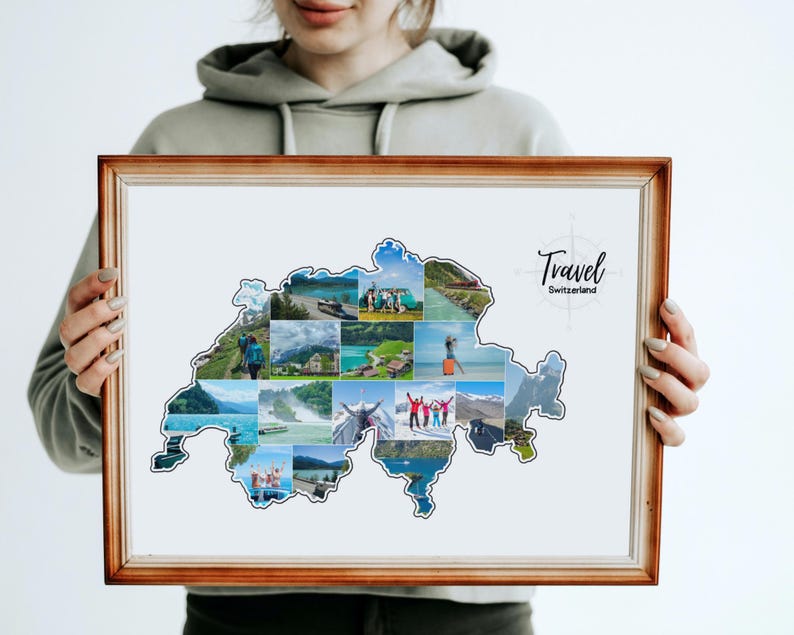 May include: A framed print showing a collage of images in the shape of Switzerland. The collage includes various scenic views and people. The frame is a light brown colour, and the print has the words "Travel Switzerland" in black script.