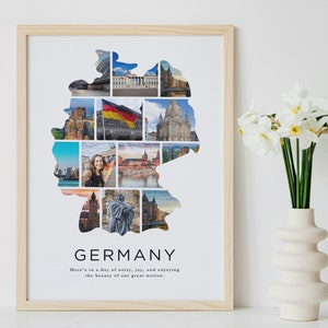 May include: A framed print of a collage of images of Germany, arranged in the shape of the country's outline. The collage includes iconic landmarks, scenic views, and a photo of a person. The text "GERMANY" and a quote about unity and joy are printed below the collage.