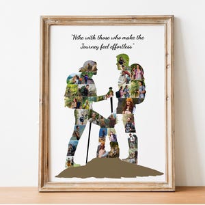 May include: Framed art print featuring two hikers composed of smaller photos, with the quote "Hike with those who make the Journey feel effortless." The artwork is set against a white background, framed in a light brown wooden frame, and rests on a wooden surface.