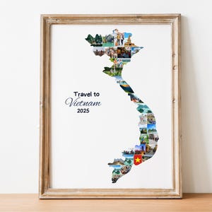 May include: Framed print featuring a collage of images forming the shape of Vietnam. The print includes the text "Travel to Vietnam 2025" in elegant script. The frame is a light brown color, and the print is displayed on a wooden surface.