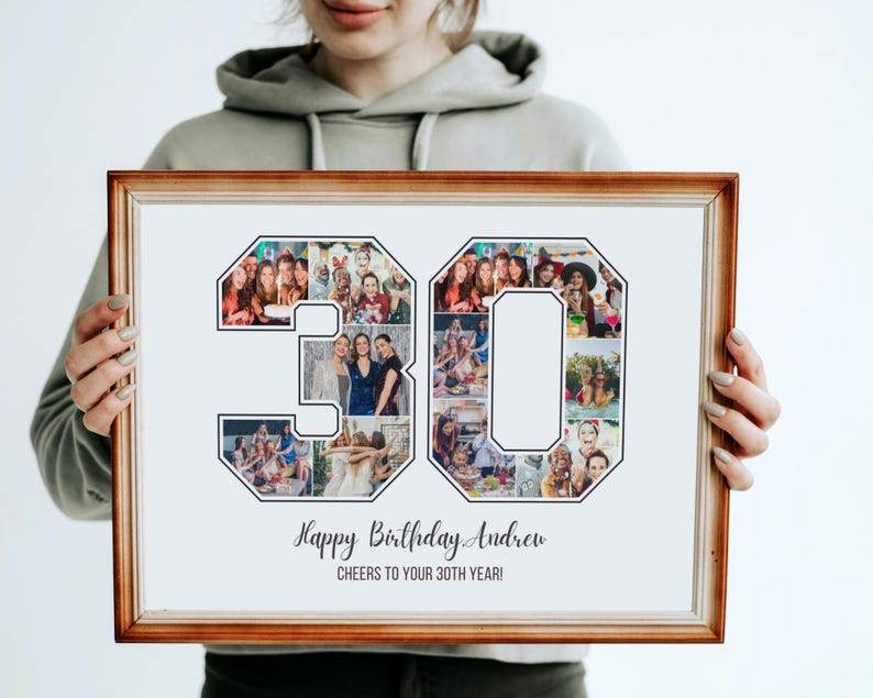 May include: A framed photo collage in a brown frame with a white background. The collage is shaped like the number 30 and is made up of photos of people. The text "Happy Birthday Andrew" and "Cheers to your 30th year!" is printed below the collage.