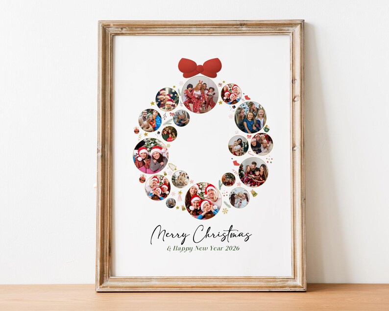 May include: Framed Christmas wreath photo collage with a red bow at the top. The wreath is composed of circular photos of people. The text "Merry Christmas & Happy New Year 2026" is written in a script font.