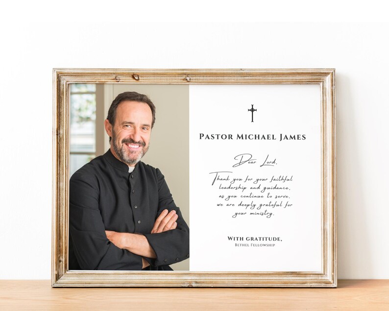 May include: Framed portrait of a man in a black clerical shirt, smiling with arms crossed. The right side of the frame has text: "PASTOR MICHAEL JAMES" and a handwritten message of gratitude. The frame has a gold finish.