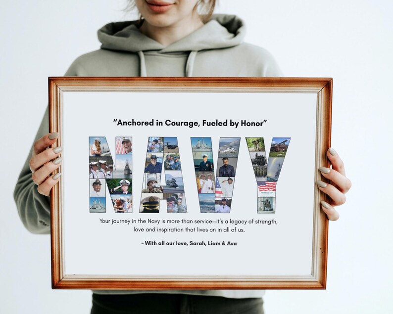 May include: A framed print with the word "NAVY" spelled out in a collage of photos. The print has a brown wooden frame and includes the text "Anchored in Courage, Fueled by Honor." Additional text reads, "Your journey in the Navy is more than service..." and "With all our love, Sarah, Liam & Ava."