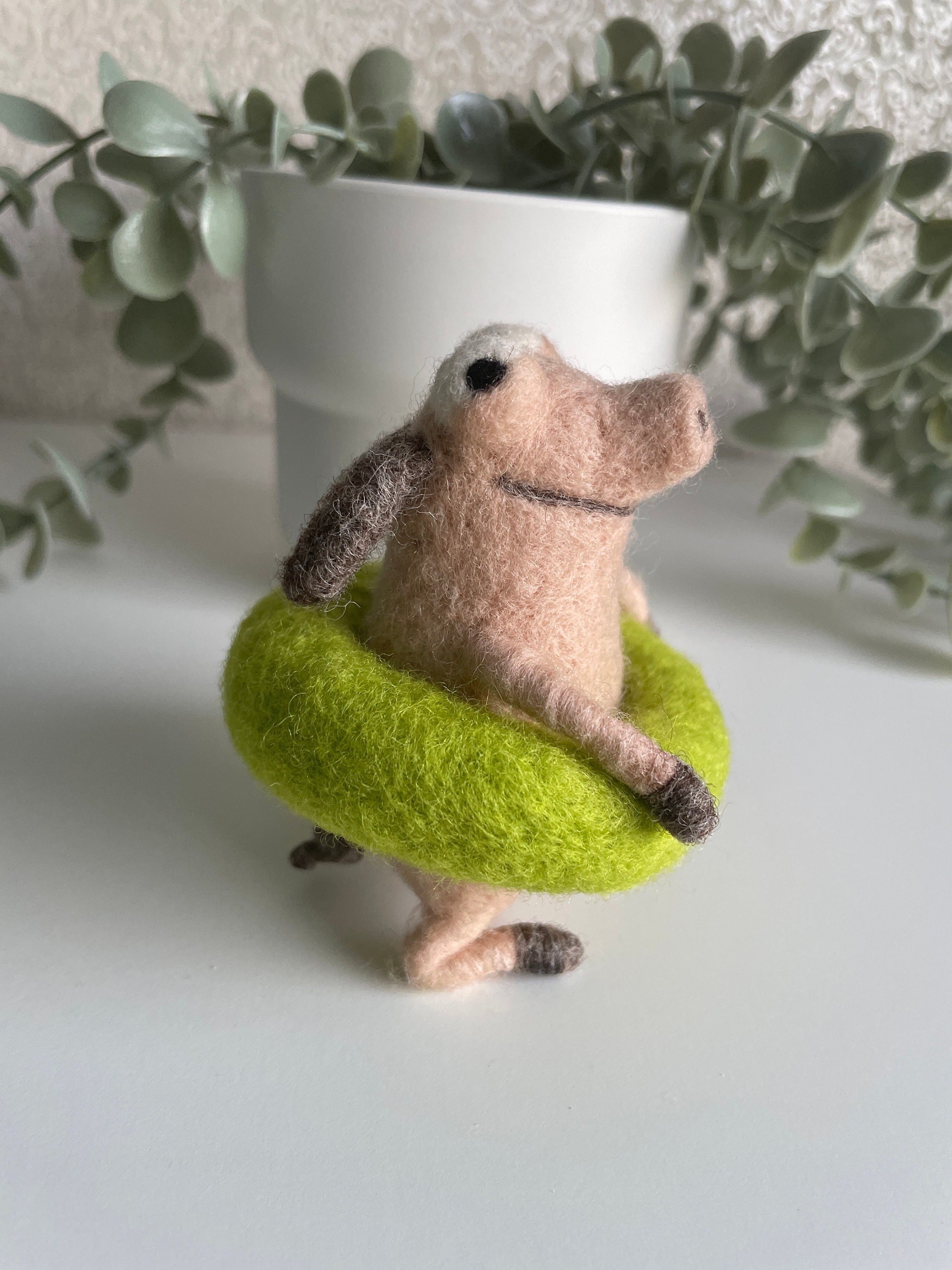 Funny bathing pig with swimming ring, felt figure