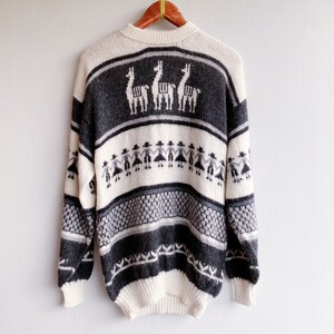 Gezellige vintage coltrui met alpacaprint van wol