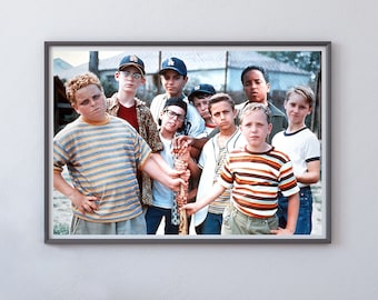 May include: A group of eight boys wearing baseball caps and striped shirts stand together. They are holding a baseball bat and smiling at the camera.